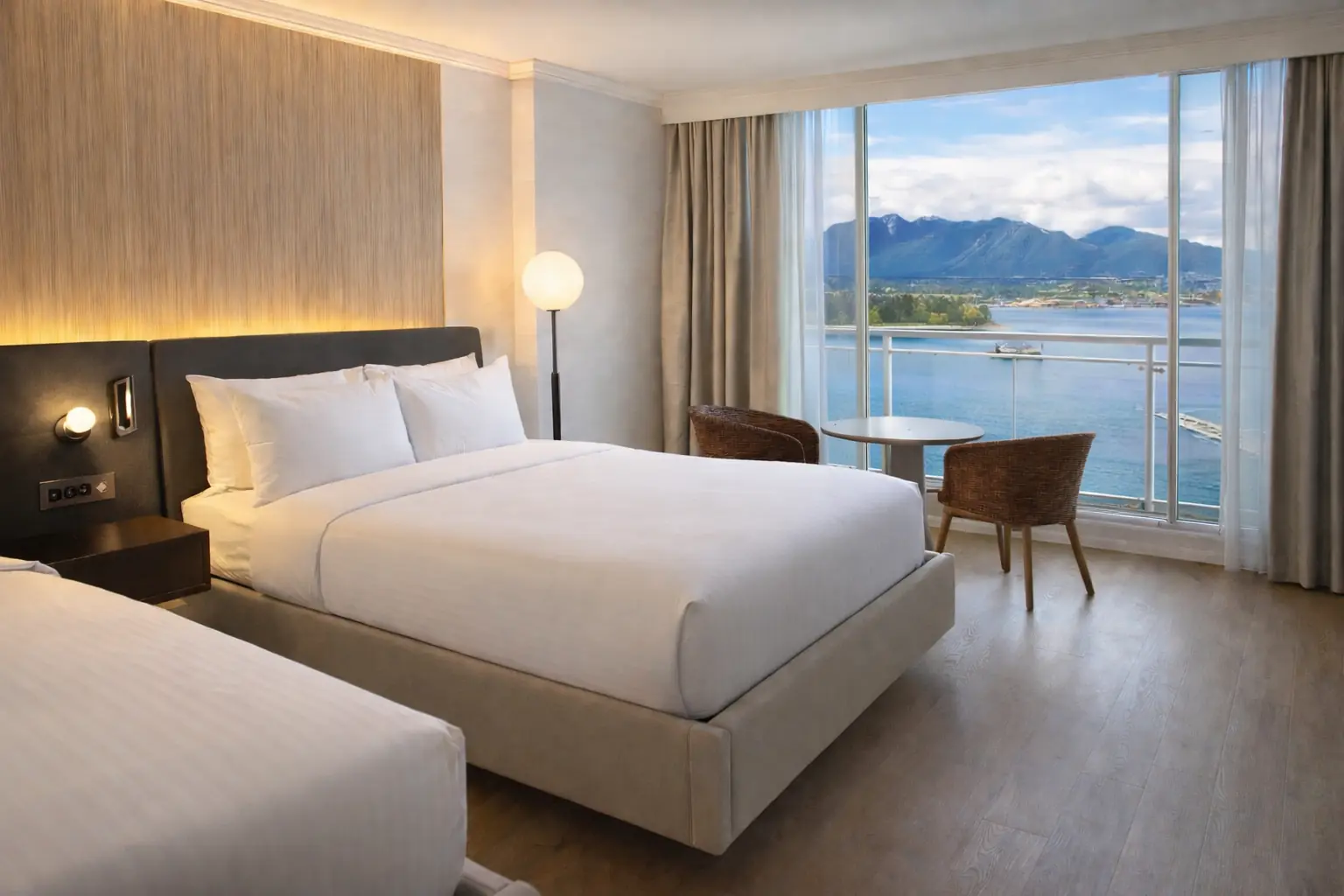 Guest room at Pinnacle Hotel Harbourfront with Coal Harbour views